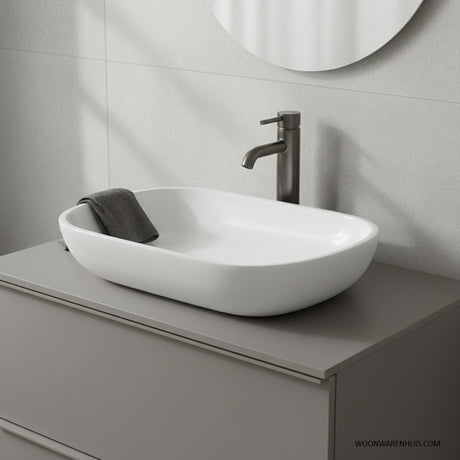 Differnz ovalo waskom - ovaal opzetmodel voor de badkamer - gemaakt van polybeton - zonder overloop - eenvoudig te installeren op het badmeubel - afmetingen 54 x 34 x 12 cm - kleur wit