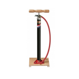 fietspomp op houten plank met Dunlop ventiel