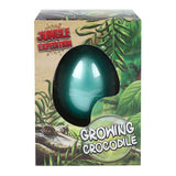 Jungle Expediton Egg con coccodrillo in crescita, 6 cm