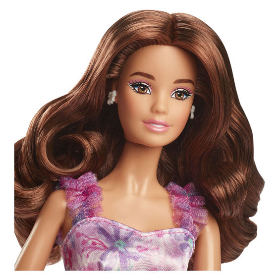 Mattel signature doll with blond hair and black and white evening