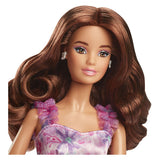 Mattel signature doll with blond hair and black and white evening