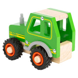 Tractor de madera de pie pequeño verde