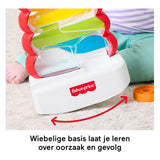 Fisher-price rollende ringen in wiebelende stapeltoren