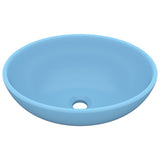 Vidaxl wastafel ovaal 40x33 cm keramiek mat lichtblauw