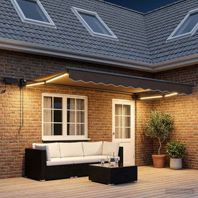 Vidaxl handbediende luifel met led's taupe 100% polyester en aluminium